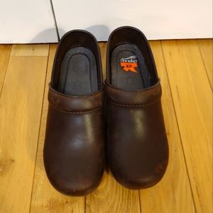 Dansko Brown Leather Clogs, Size 6, good condition.